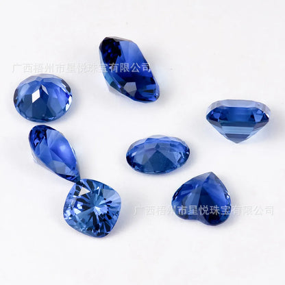 Royal blue love shaped tiara cultivate gemstone in heart and round cuts for jewellery making.