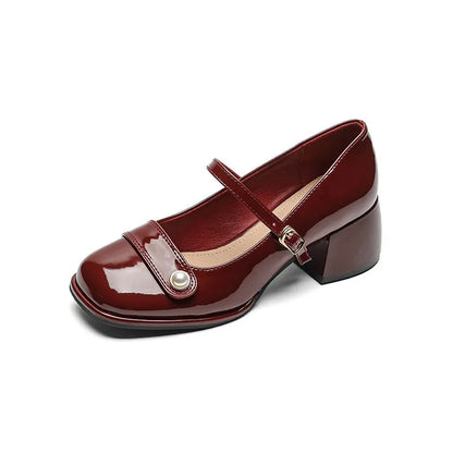 Women's apricot patent leather chunky heel ankle strap pumps with a square toe on a white background