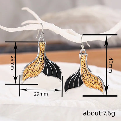 Women's fishtail-shaped earrings with whale motif in white gold colour retro style