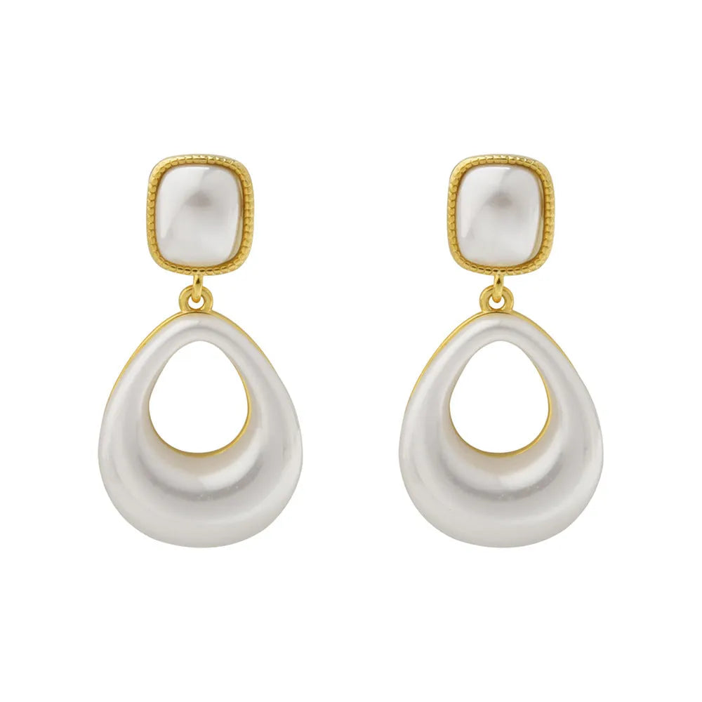 Gold-plated mabe pearl drop earrings with imitation pearl drops and office-appropriate styling