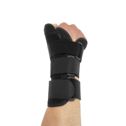 Carbon fibre sports wrist guard with thumb strap in black and grey colour scheme