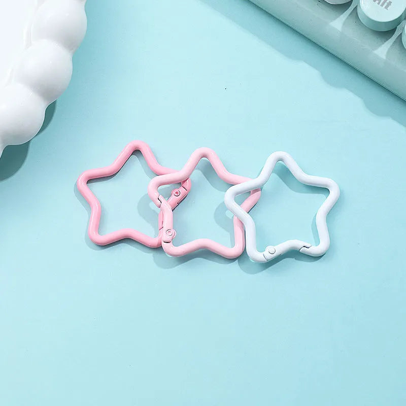 Zinc alloy five-pointed star keychain in various macaron colours.