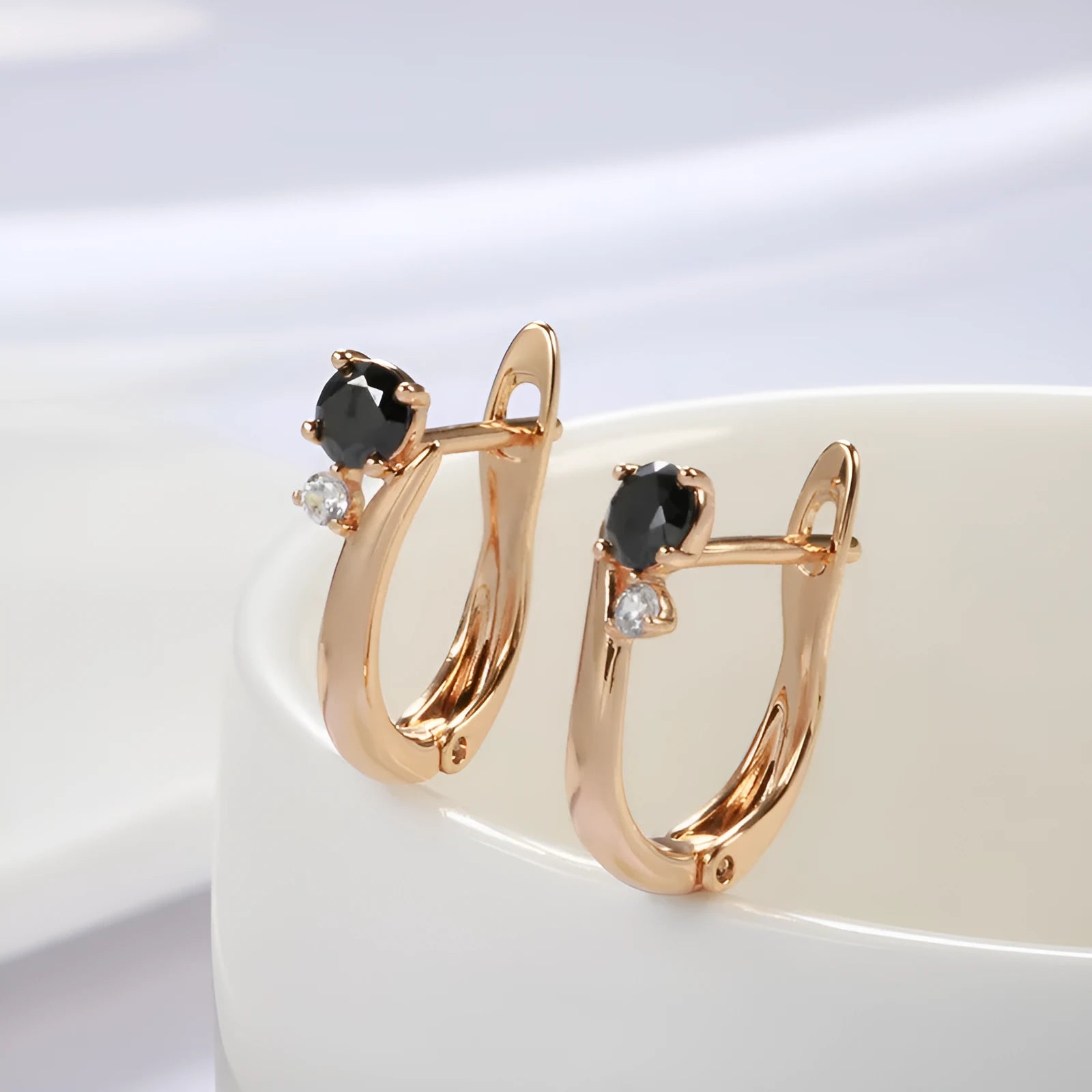 Gold geometric drop earrings with black agate gemstone inlay and retro styling