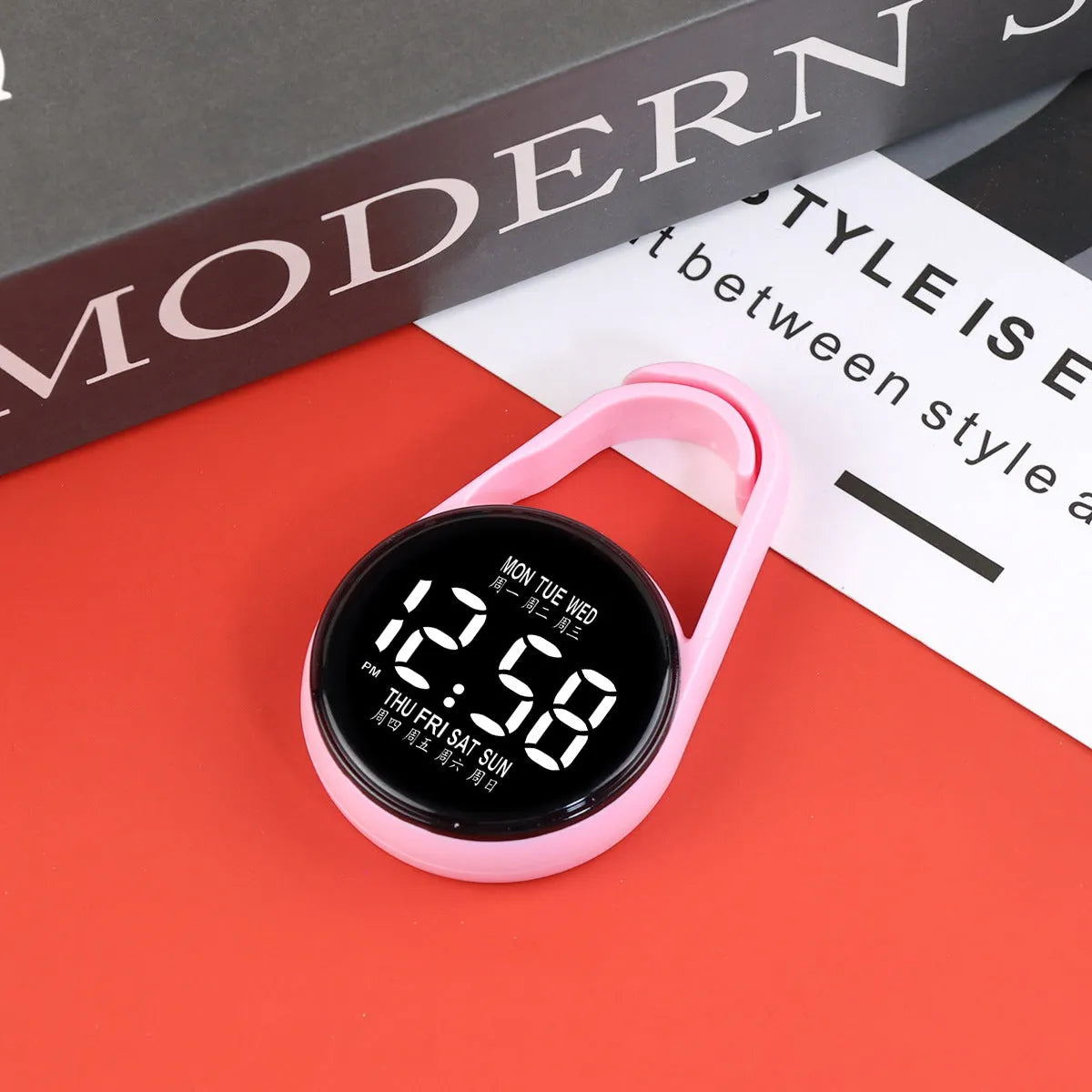 Mini digital LED electronic watch with plastic strap in various colours like fluorescent green and black on display.
