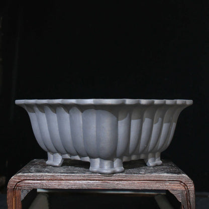 Square purple sand ceramic bonsai pot with 37cm diameter on desktop with small plant