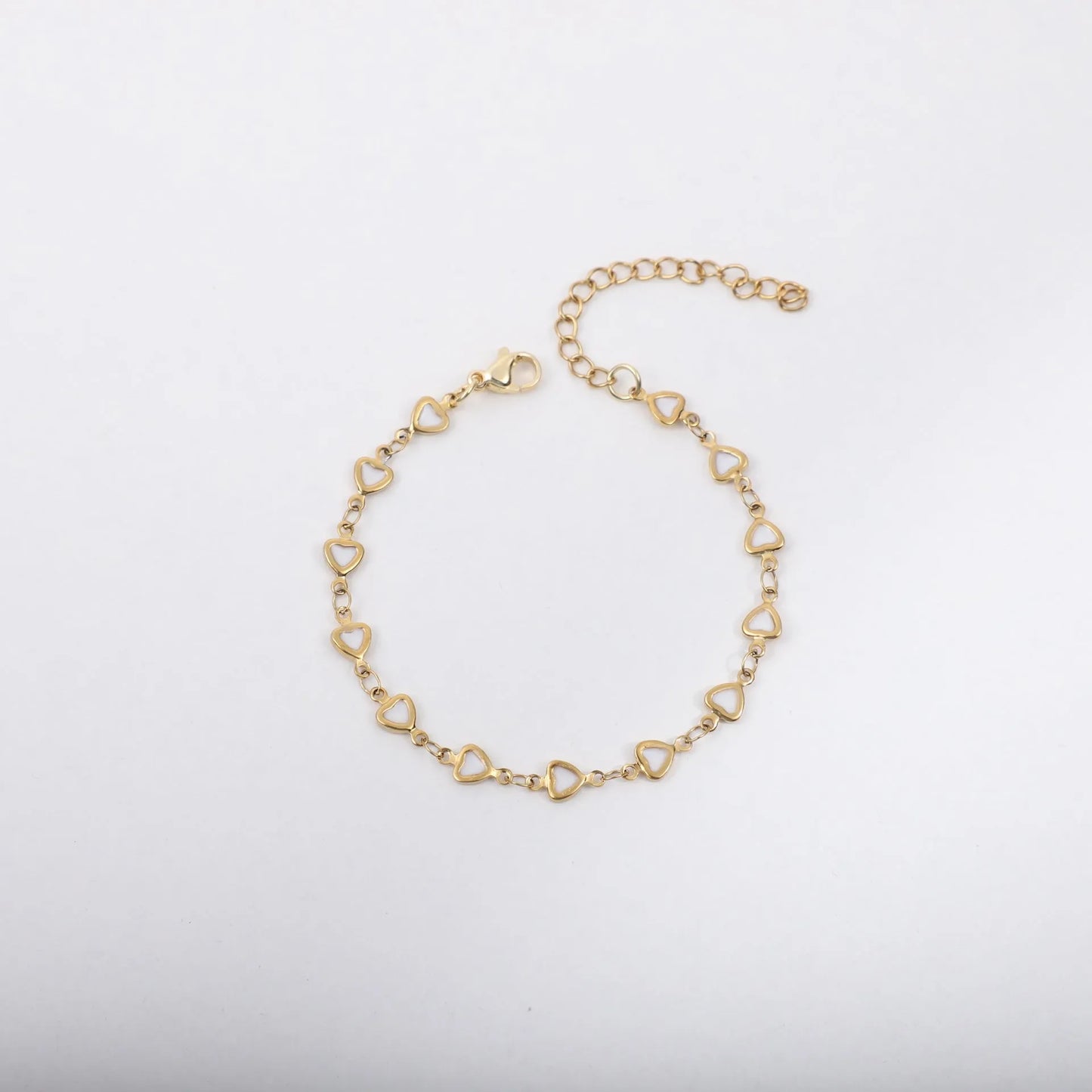 Stainless steel heart bracelet with 18K gold plating in multiple colours showing adjustable 17+5cm length