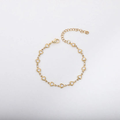Stainless steel heart bracelet with 18K gold plating in multiple colours showing adjustable 17+5cm length