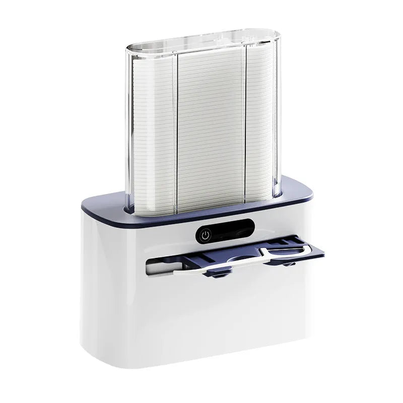 Dark grey automatic electric dental floss box with pop-up mechanism on a bathroom counter.