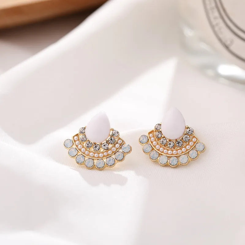 Women's retro sterling silver needle opal fan-shaped rhinestone earrings with geometric design and electroplated finish.