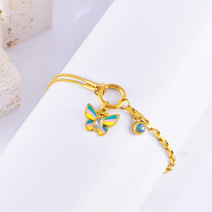 Gold titanium steel jewellery set with colourful epoxy butterfly pendant necklace and matching bracelet