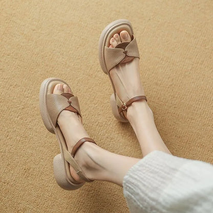 Beige women's chunky heel platform sandals with an open toe and rubber sole.