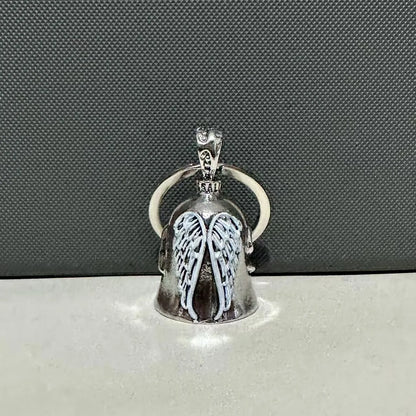 Vintage silver-tone angel wings feather keychain and necklace on a white background.