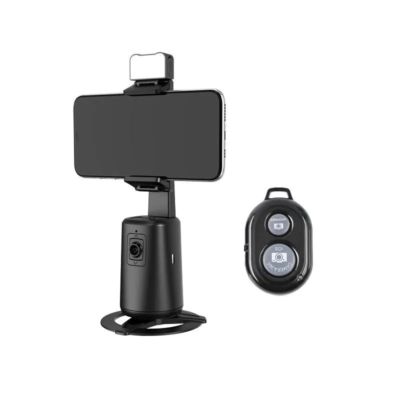 Black desktop phone holder with intelligent face tracking, rotating camera head, and ribbon LED lighting