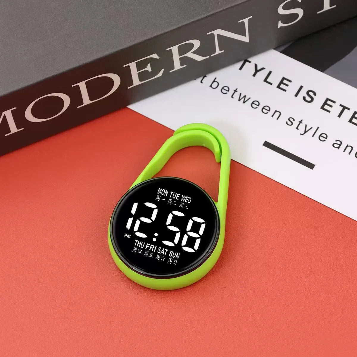 Mini digital LED electronic watch with plastic strap in various colours like fluorescent green and black on display.