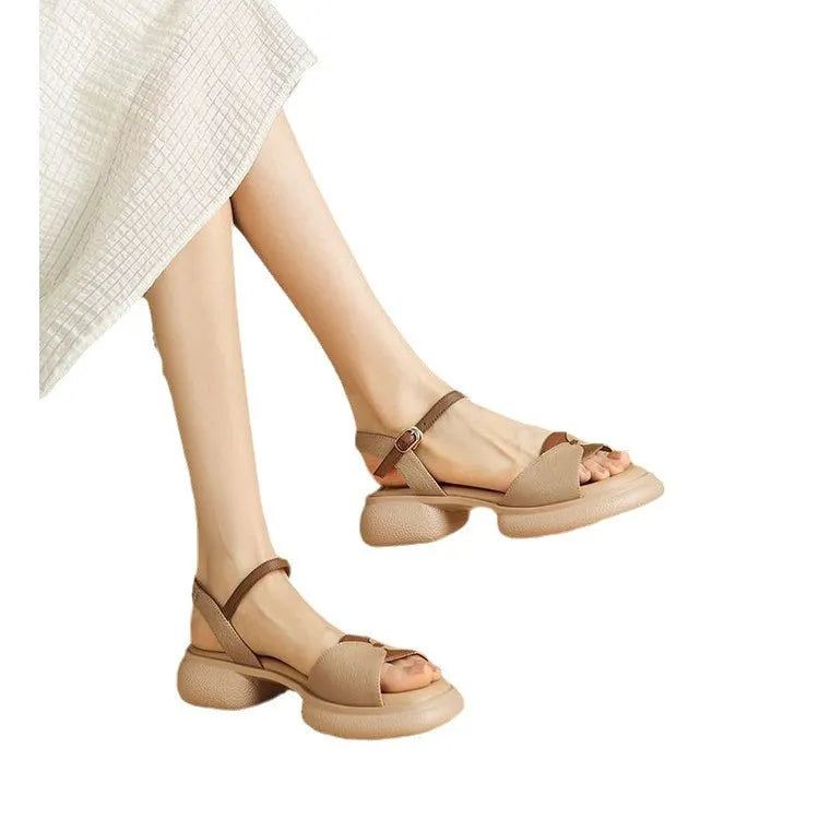 Beige women's chunky heel platform sandals with an open toe and rubber sole.
