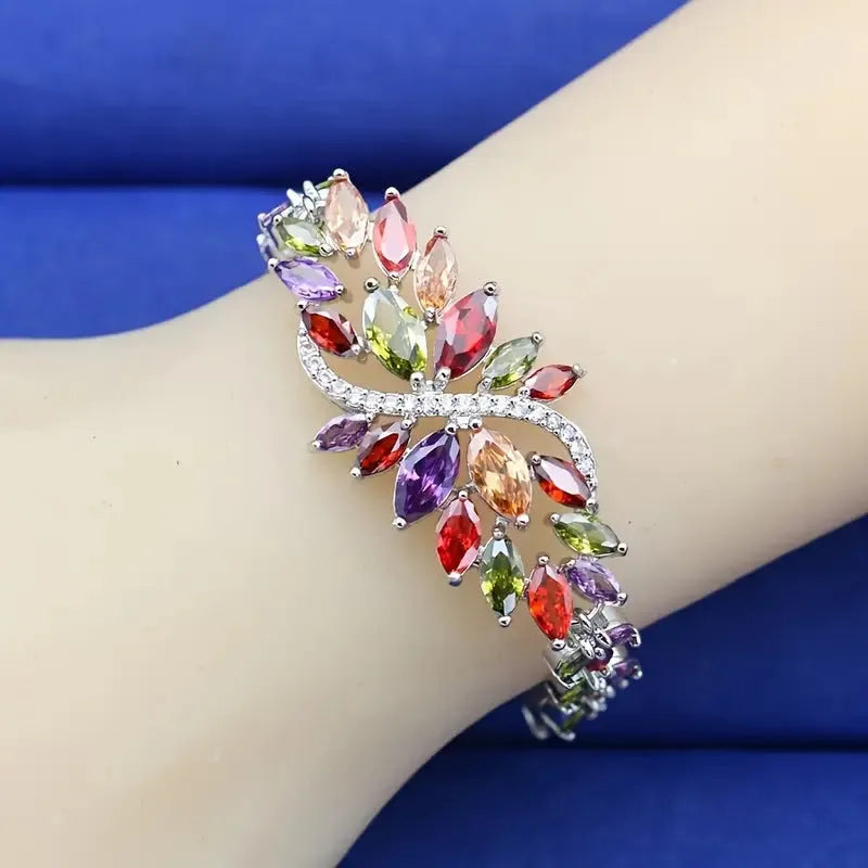 Gold-electroplated copper bracelet with colour zircon stones and ice flower decorative elements
