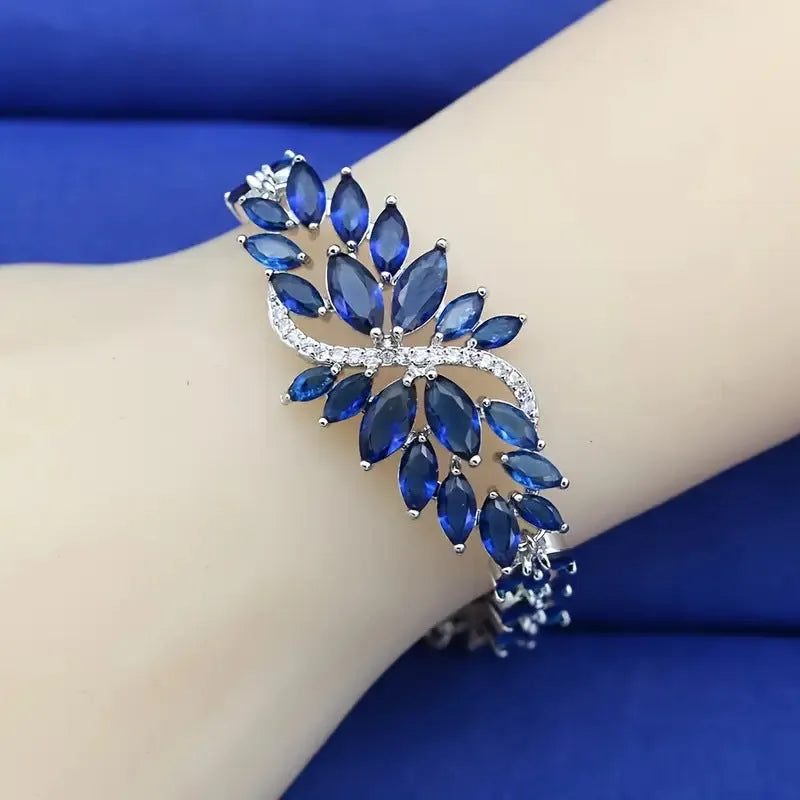 Gold-electroplated copper bracelet with colour zircon stones and ice flower decorative elements