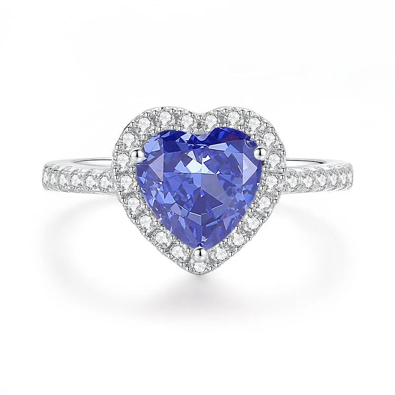 Heart-shaped sterling silver ring with zircon stone in ice flower cut, showing 1.5 cm width and 1.8 cm height dimensions