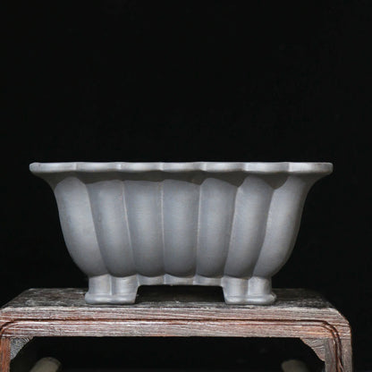 Square purple sand ceramic bonsai pot with 37cm diameter on desktop with small plant