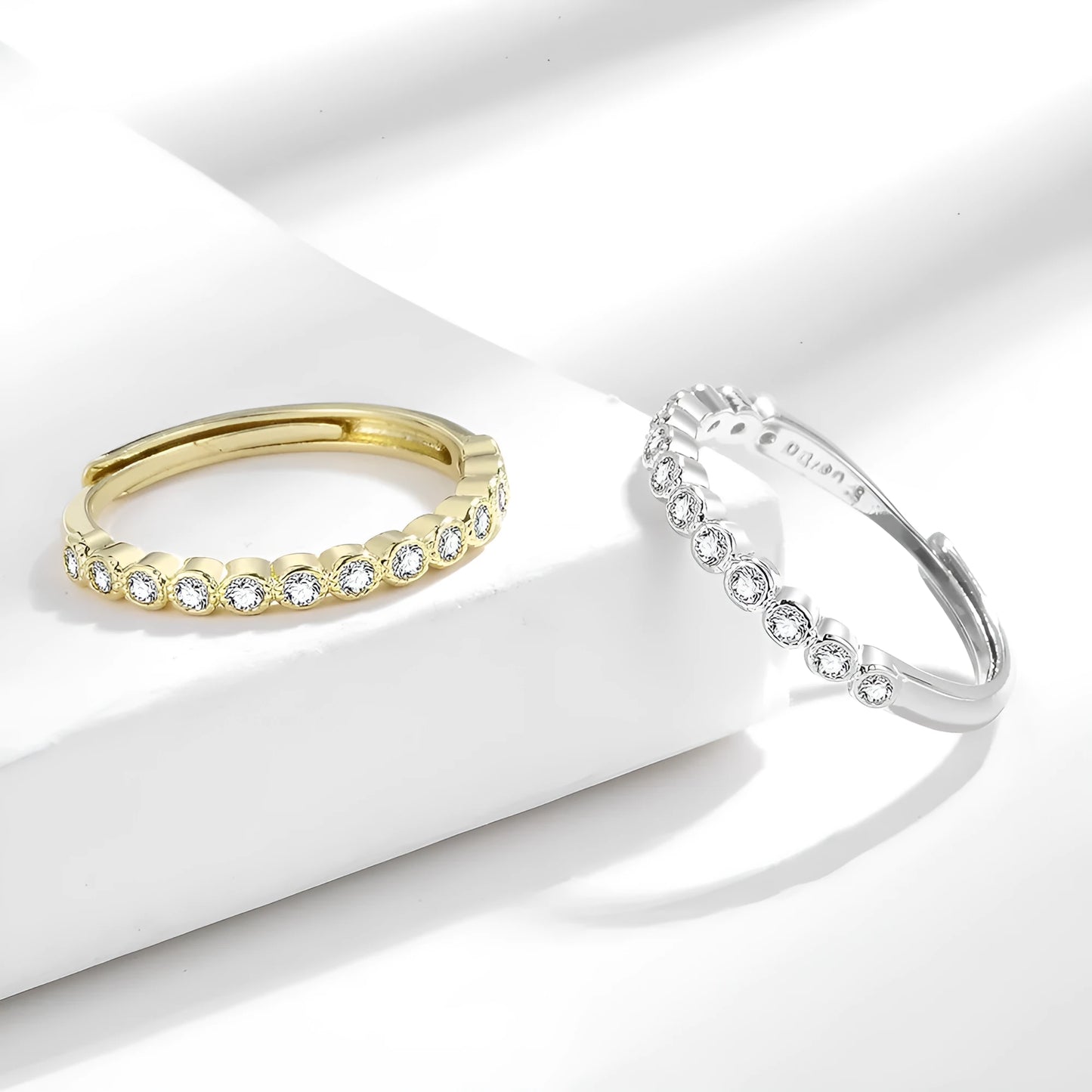 Geometric open mouth women's tail ring in electroplated copper, shown in white gold and yellow gold colour options.