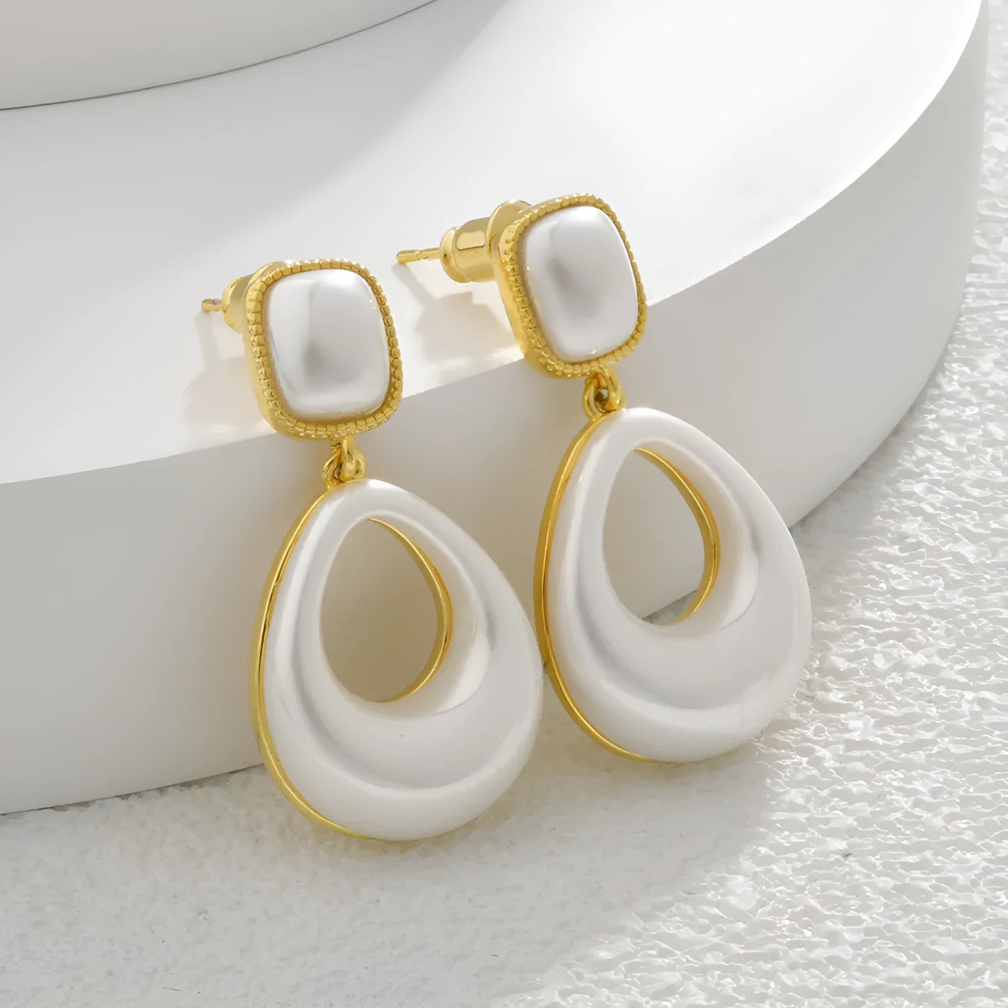 Gold-plated mabe pearl drop earrings with imitation pearl drops and office-appropriate styling