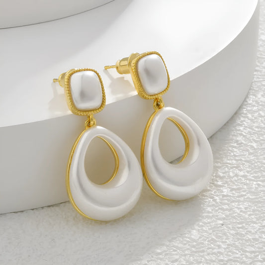 Gold-plated mabe pearl drop earrings with imitation pearl drops and office-appropriate styling