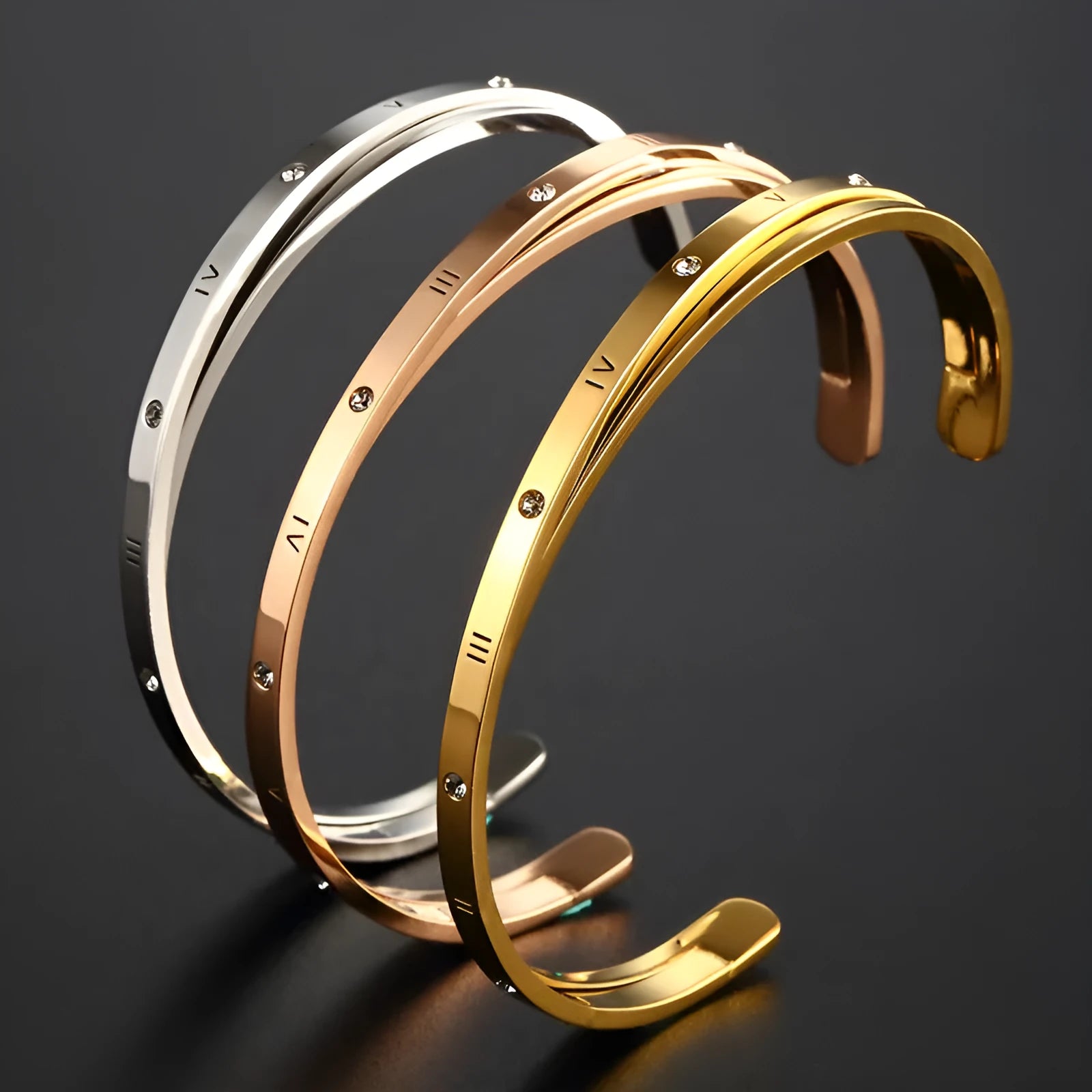 Women's open-ended stainless steel bracelet with a central inlaid zircon stone in rose gold colour.