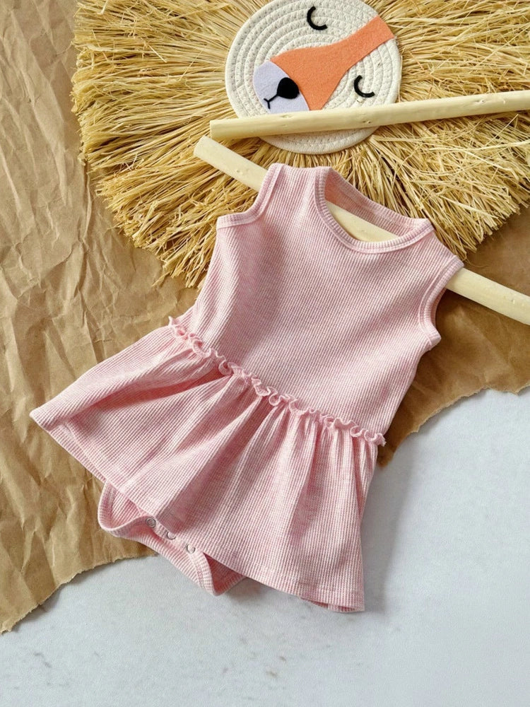 Baby girl wearing pink sleeveless vest onesie with waffle cotton texture and single-breasted closure