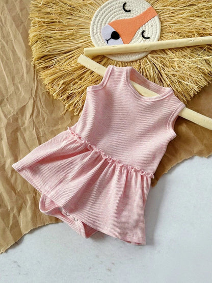 Baby girl wearing pink sleeveless vest onesie with waffle cotton texture and single-breasted closure