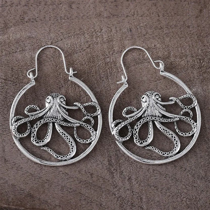 Close-up of vintage-style octopus earrings in antique silver colour with zinc alloy construction.