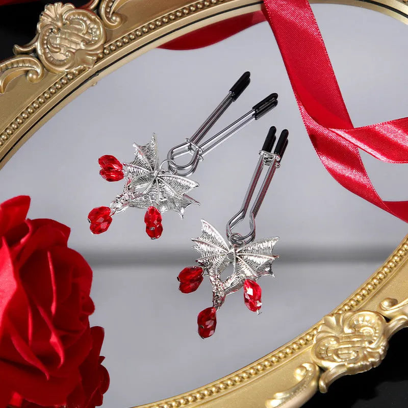 Silver bat nipple clamp with ruby design and adjustable spring mechanism