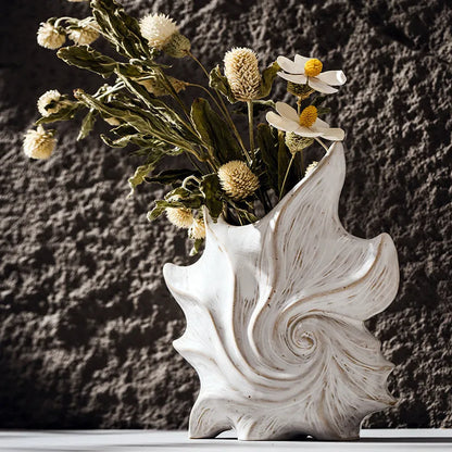 French art ceramic vase with coloured glaze in a European retro style, shown empty on a wooden surface.