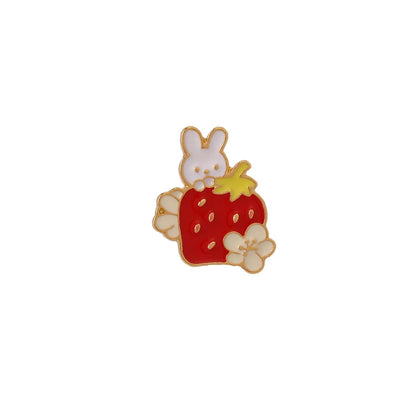 Close-up of a cute cat strawberry and dripping cake oil design metal alloy brooch pin.