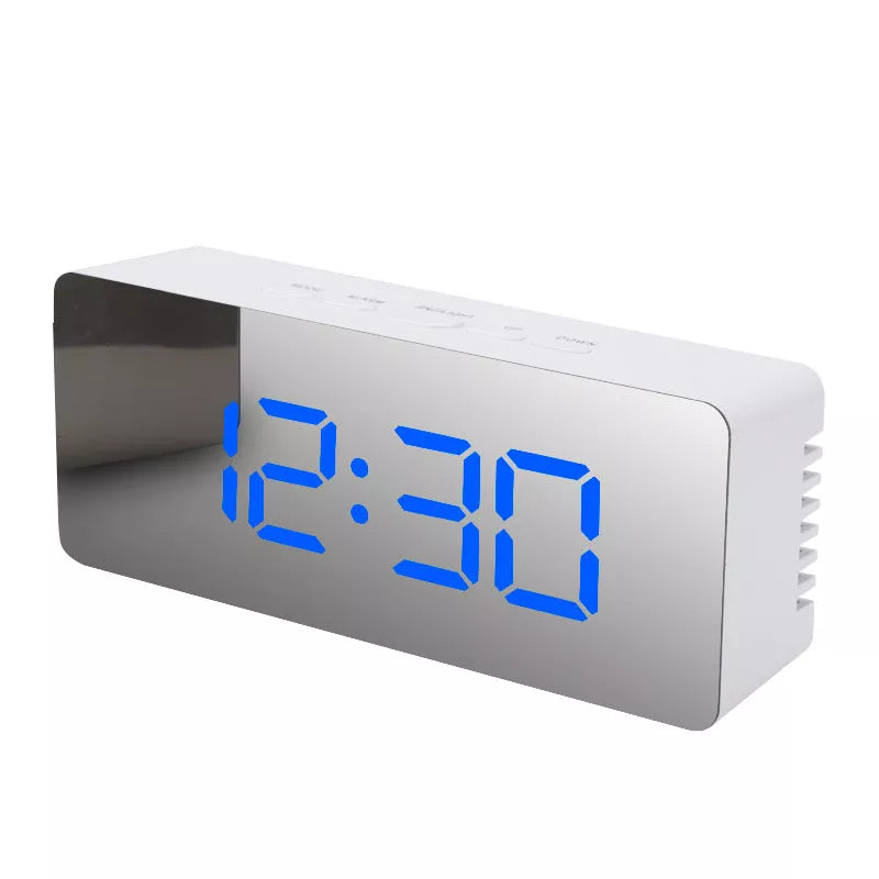 LED Digital Mirror Alarm Clock with customizable light colors on a desktop