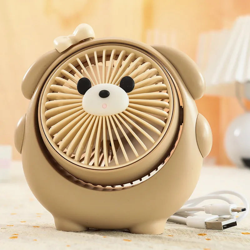 USB desktop fan with dog design showing three speed buttons and USB port, placed on a desk.