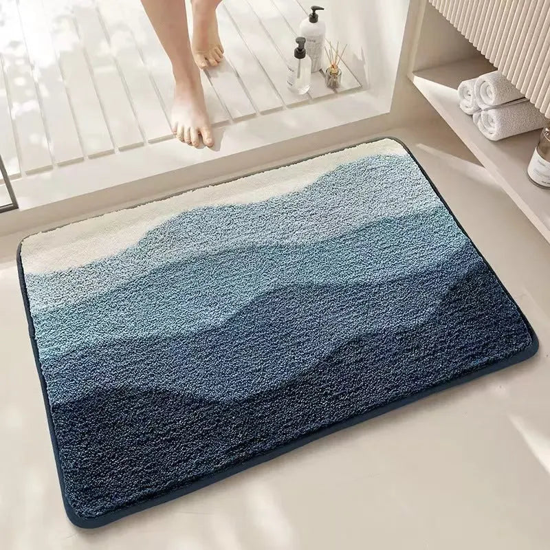 Cashmere carpet floor mat with plastic bottom in Sky Sea colour showing rainbow pattern, square shape with flat construction