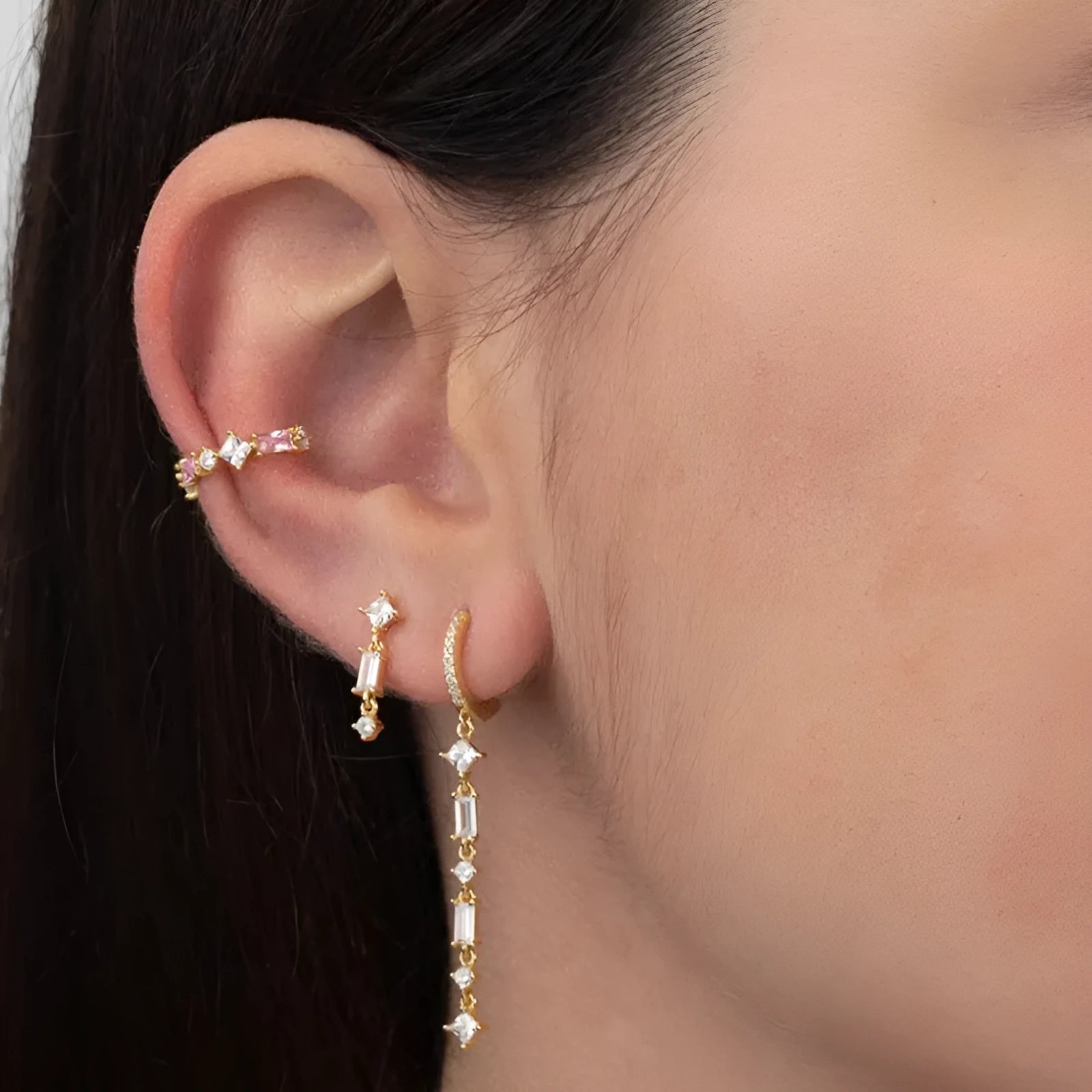 Geometric U-shaped gold ear clips with colourful zircon stones and dot pattern detailing