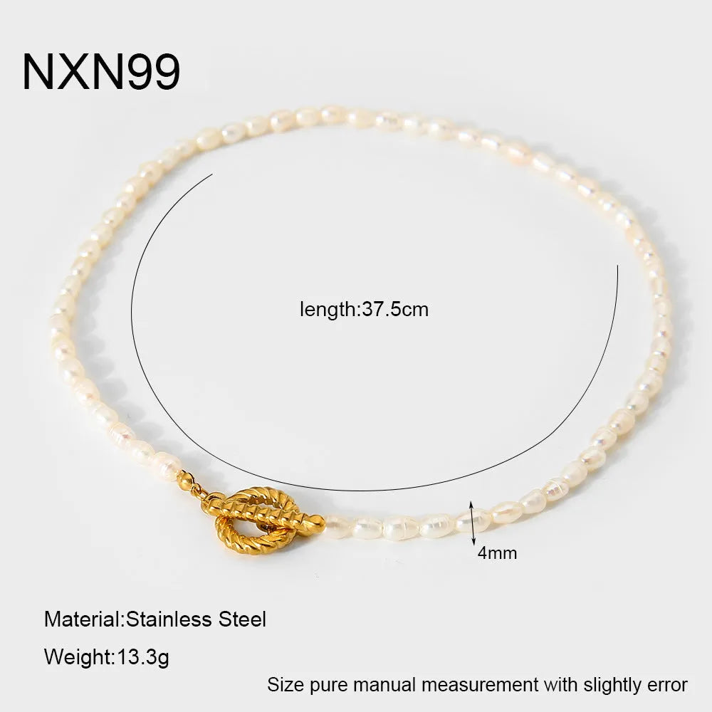 Freshwater pearl and geometric stainless steel necklace and bracelet set for women on a white background.