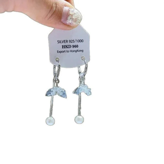 Geometric star-shaped alloy ear clip with rhinestones and hanging tassels for women