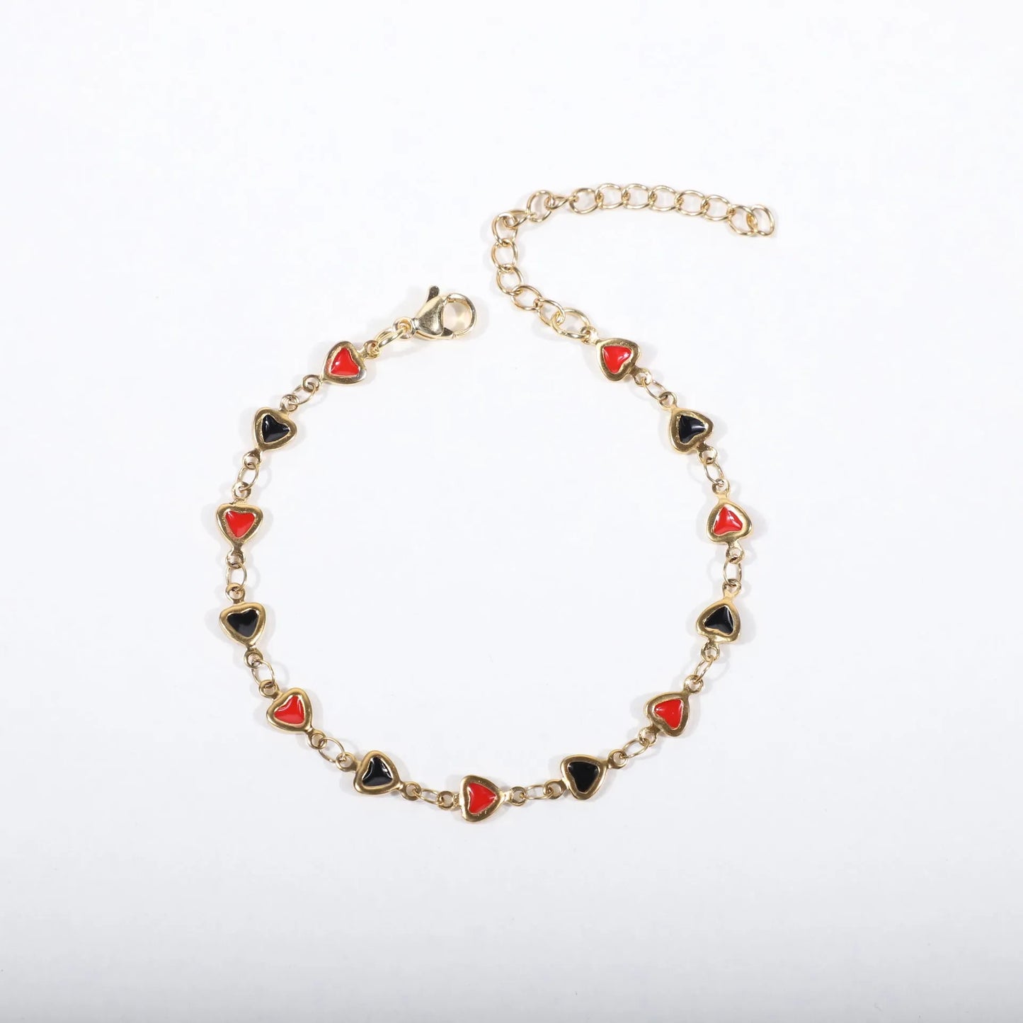 Stainless steel heart bracelet with 18K gold plating in multiple colours showing adjustable 17+5cm length