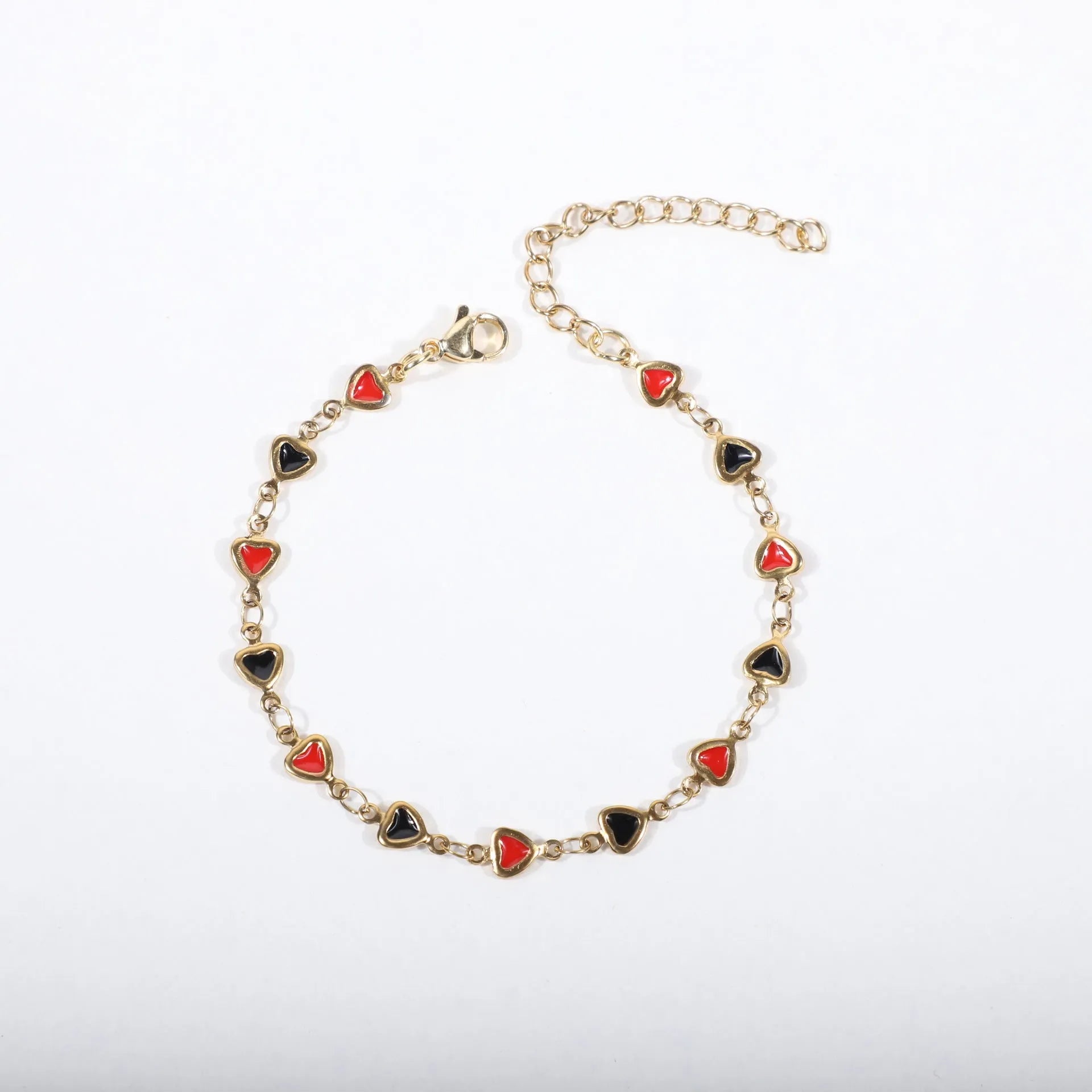 Stainless steel heart bracelet with 18K gold plating in multiple colours showing adjustable 17+5cm length