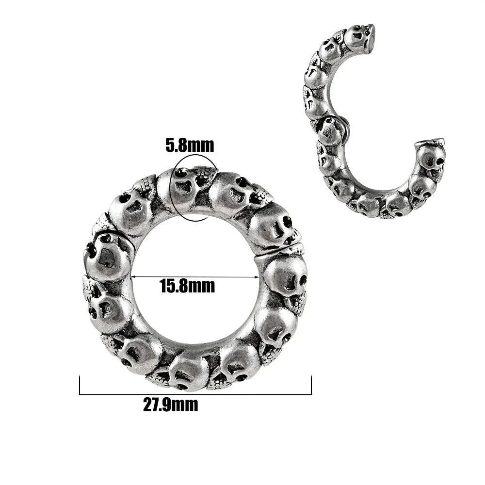 A pair of stainless steel fashion earrings featuring a totem pattern design in an electroplated colour.