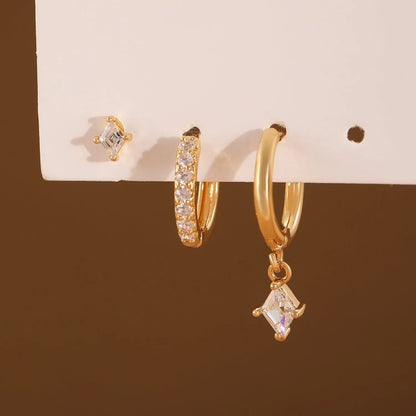 Geometric zircon earring three-piece set for ladies in gold and silver tones.