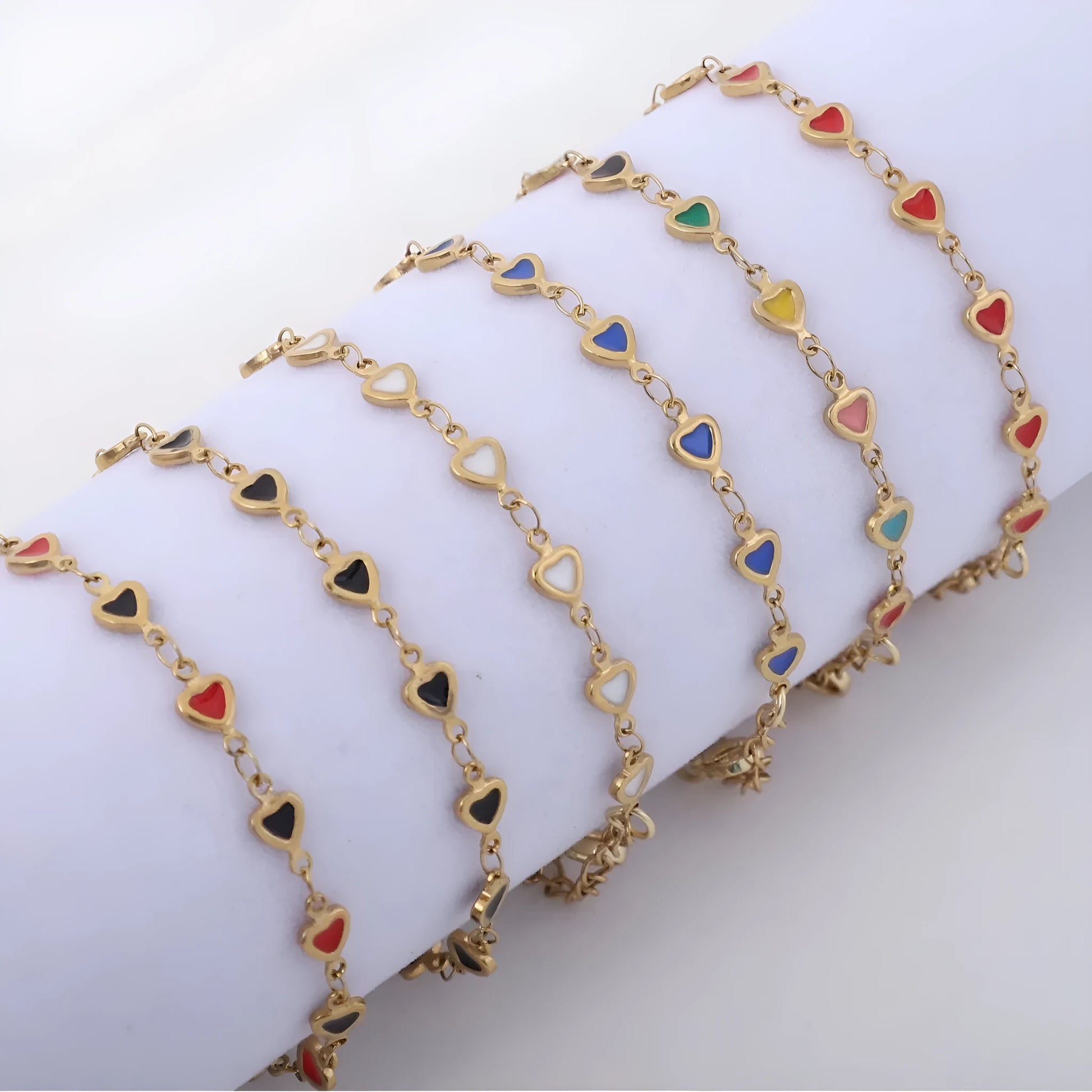 Stainless steel heart bracelet with 18K gold plating in multiple colours showing adjustable 17+5cm length