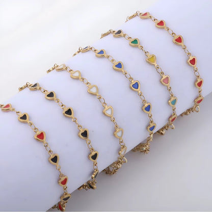Stainless steel heart bracelet with 18K gold plating in multiple colours showing adjustable 17+5cm length
