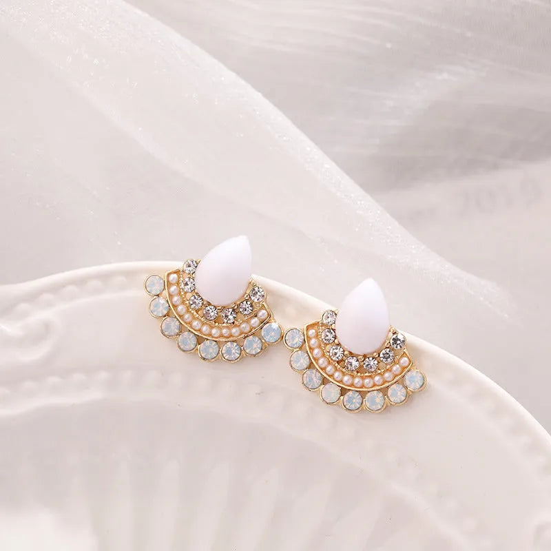 Women's retro sterling silver needle opal fan-shaped rhinestone earrings with geometric design and electroplated finish.
