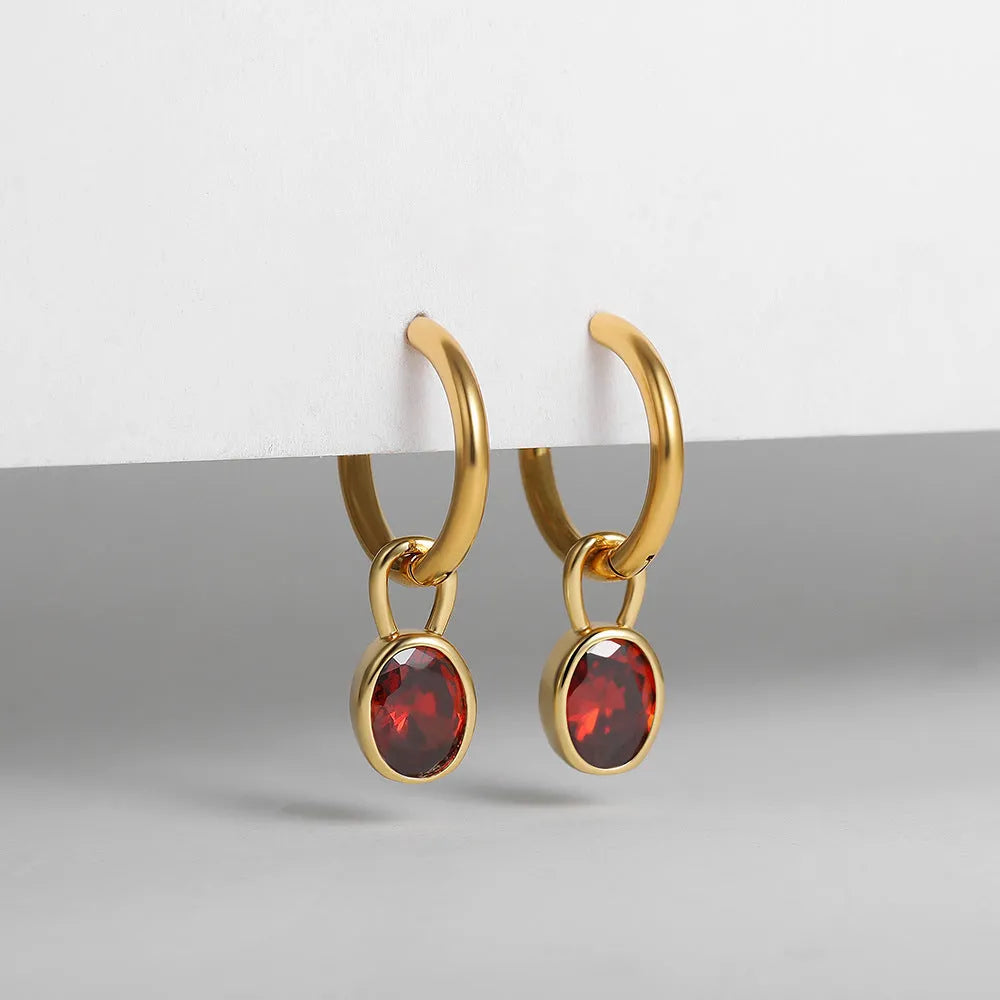 Women's copper oval earrings in six colour options showing elliptical 1.5cm retro design