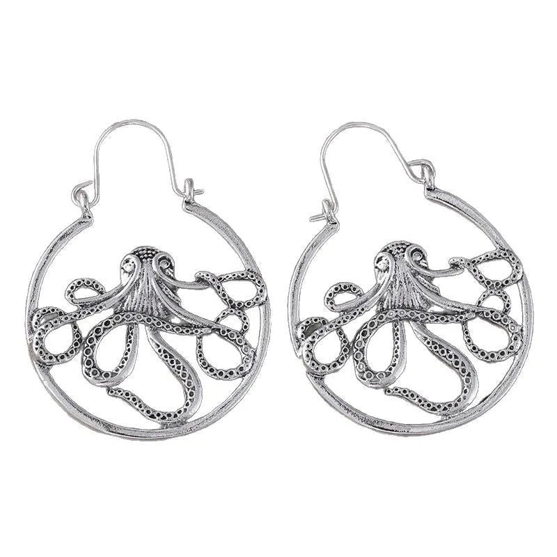 Close-up of vintage-style octopus earrings in antique silver colour with zinc alloy construction.
