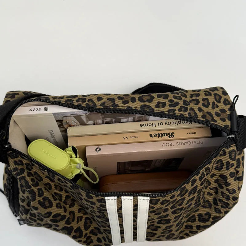 Leopard print sports style shoulder messenger bag with visible stitching and cross-body strap