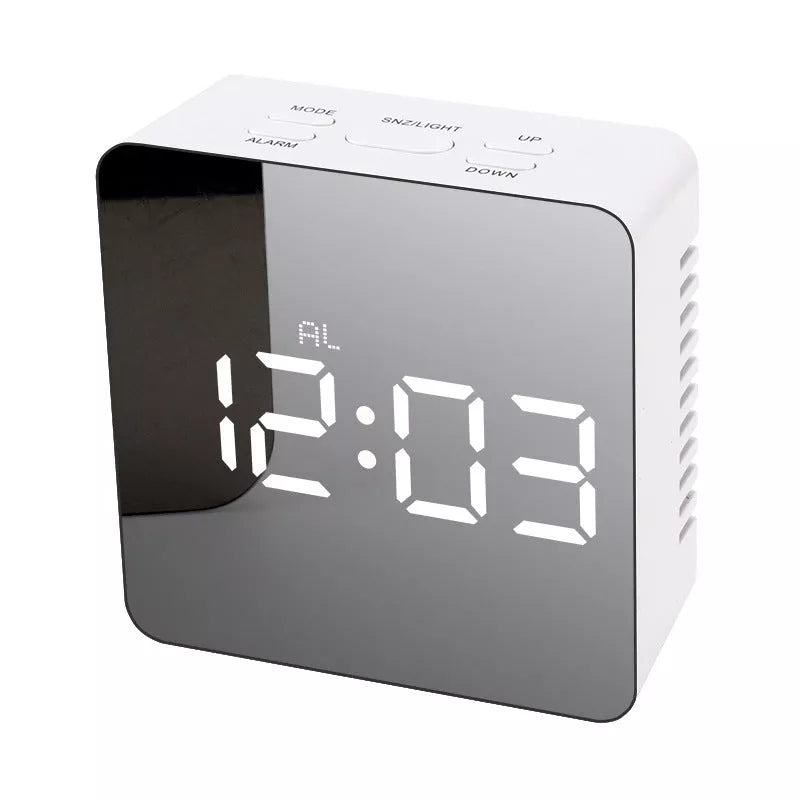 LED Digital Mirror Alarm Clock with customizable light colors on a desktop